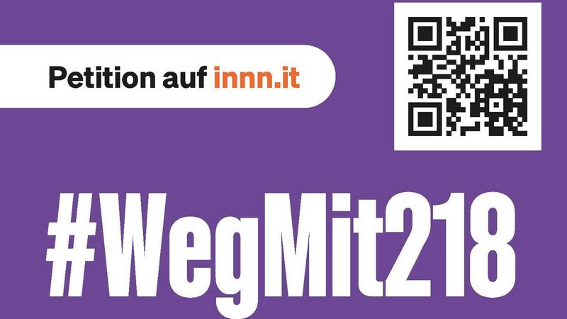 Das Foto zeigt den QR-Code zur Petition und den Text #WegMit218