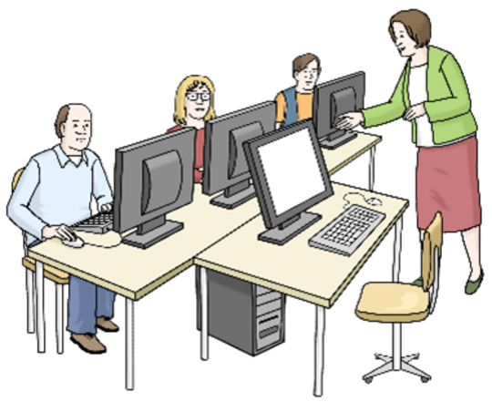 Das Foto zeigt Menschen bei einer Schulung an Computern