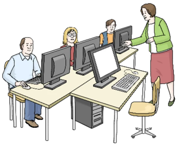 Das Foto zeigt Menschen bei einer Schulung an Computern