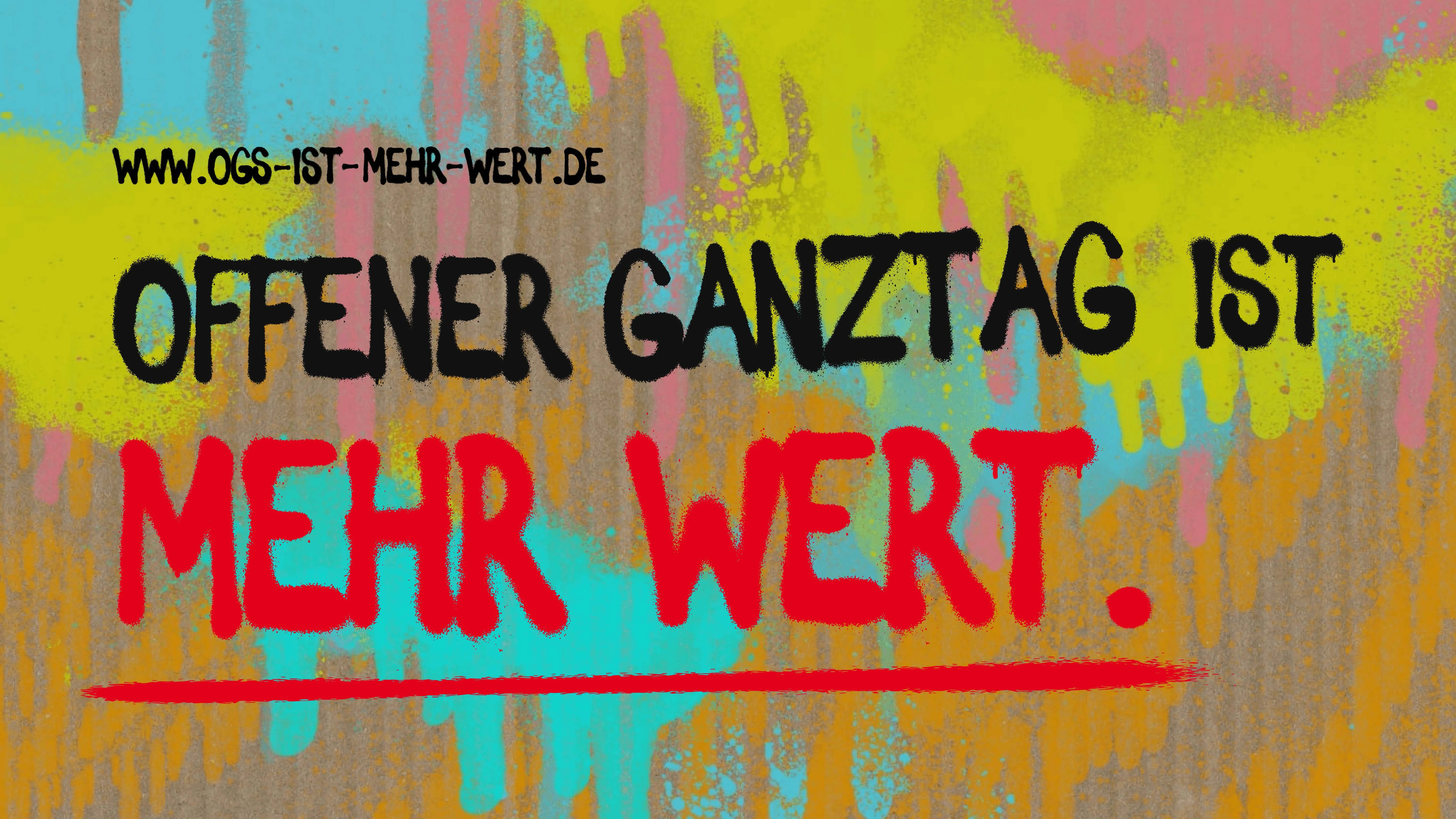Das Bild in der Meldung zeigt eine grafische Darstellung im Graffiti-Stil mit einem bunten, farbenfrohen Hintergrund (gelbe, rote, blaue und grüne Töne). Darauf steht in auffälliger Schrift der Slogan: „Offener Ganztag ist mehr wert." Der Text „MEHR WERT." ist dabei in roter Farbe besonders hervorgehoben und unterstrichen. Oben links ist zudem der Hashtag #OGSMehrWert sowie eine Website-Adresse (www.ogs-ist-mehr-wert.de) zu lesen. Unten rechts findet sich ein weiterer Hashtag