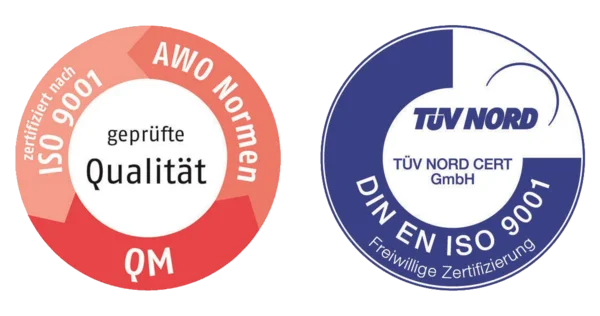 Das Foto zeigt die Prüfsiegel des AWO Bundesverbandes und des TüV Nords